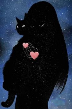 a black cat with a pink heart on its chest