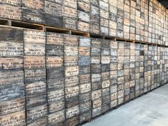 several stacks of wooden crates stacked on top of each other