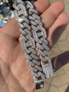 Men's prong cuban with gucci links
We have it from 18" to 30" so wear as a mens choker or as a longer bust down link
 
Heavy 150-250 grams depending on length!
15.5mm wide so it’s a thick yet not too gaudy
 
80ct man made diamonds
Gorgeous baguette & round stones 
You can’t tell difference from natural diamonds without a microscope 
Super ICY you have to see to believe!!
 
Solid 925 silver
Will never turn!! This is SOLID silver! Great Luxury Silver Chain Cuban Link Bracelet, Luxury Cuban Link Silver Chain Bracelet, Luxury Silver Jewelry For Streetwear, Iced Out Chain Link Jewelry For Streetwear, Designer Iced Out Jewelry For Formal Occasions, Streetwear Jewelry With Box Chain And Cuban Link, Figaro Chain Link Jewelry For Streetwear, Luxury Silver Cuban Link Necklace With Figaro Chain, Mens Choker