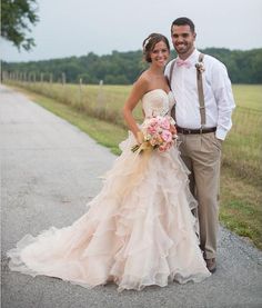 a bride and groom posing for a photo