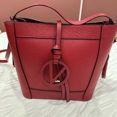 Brand New With Tag Size H10.5-W13-D6 Red Luxury Bucket Bag With Detachable Handle, Luxury Red Bucket Bag With Detachable Handle, Luxury Red Top Handle Bucket Bag, Designer Red Rectangular Bucket Bag, Red Top Handle Bucket Bag With Gold-tone Hardware, Luxury Red Bucket Bag With Adjustable Strap, Designer Red Bucket Bag With Removable Pouch, Luxury Red Bucket Shoulder Bag, Designer Red Bucket Shoulder Bag