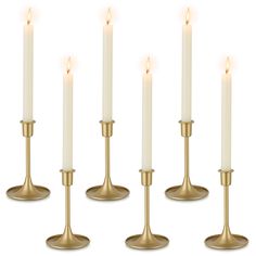 six candles are lined up in a row with one candle on each side and the other turned upside down