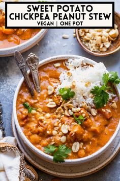 two bowls filled with red lentula and white rice, garnished with cilantro