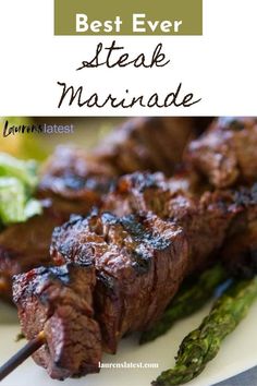 the best ever steak marinade on a plate with asparagus