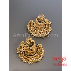 Saba Amrapali Inspired Golden Polki Chandbali Earrings Premium Quality Polki Chandbali Earrings Length: Approx. 2" Light-weight Push-Back closure Gold Finish on high-quality brass as the base metal, Kundan stones and Pearls Suitable for any traditional for contemporary attire and occasion In-stock & ready-to-ship **Color may vary slightly due to photography and lighting. Peacock Design Chandbali Earrings For Puja, Chandbali Peacock Earrings For Puja, Gold Earrings With Peacock Design For Puja, Ceremonial Chandbali Earrings For Navratri, Peacock Design Earrings For Puja Festivals, Elegant Peacock Design Earrings For Puja, Bridal Chandbali Earrings With Peacock Design For Festivals, Festival Peacock Design Earrings For Puja, Bridal Peacock Chandbali Earrings For Festivals