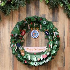 a christmas wreath is hanging on the wall