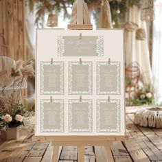 an easel with a wedding seating chart on it