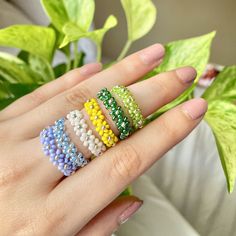 Ships 1-2 days Pretty Daisy rings available in multiple colors. These rings are are made with sturdy elastic string and Czech beads. Perfect for pairing with other rings or cute on their own I recommend avoiding water and keeping it stored away when not being worn to maintain its quality. Adjustable Multicolor Flower Ring With Colorful Beads, Adjustable Multicolor Flower Ring With Beads, Flower Bead Ring, Daisy Rings, Seed Bead Ring, Stretchy Rings, Daisy Ring, Czech Beads, Beaded Rings