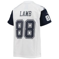 When CeeDee Lamb is on the field, opposing teams take notice, so help your youngster showcase their admiration of one of the top players in the NFL with this exclusive Dallas Cowboys Game jersey from Nike. Complete with mesh panels for extra breathability, this jersey replicates the authentic one that CeeDee Lamb wears every Sunday, giving your young fan the perfect piece of gear for every Dallas Cowboys game this season.When CeeDee Lamb is on the field, opposing teams take notice, so help your White Team Name Jersey For Fans, White Sports Fan Jersey With Team Logo, White Baseball Jersey With Team Logo, Nike Team Spirit Jersey With Team Logo, White Team Logo Jersey For Fans, White Jersey With Team Logo For Sports Fans, White Jersey With Team Logo For Fans, Nike Varsity Tops For Game Day, White Sports Fan Jersey