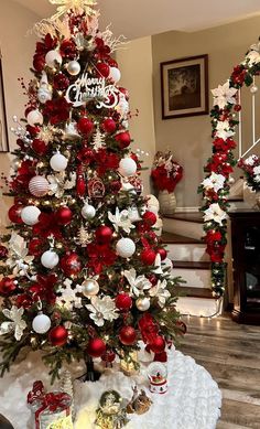 a christmas tree decorated with red and white ornaments