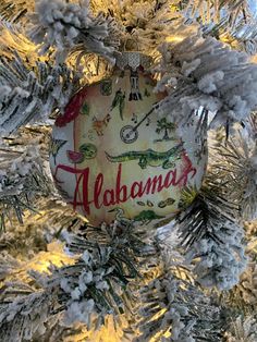 an ornament is hanging on the christmas tree