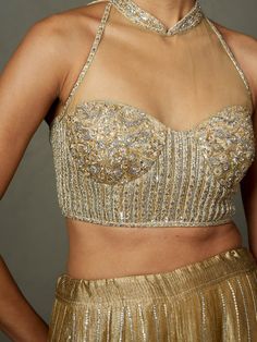 Gold Embellished Choli, Formal Festive Pre-draped Saree With Intricate Embroidery, Embellished Gold Choli, Bollywood Style Hand Embellished Blouse Piece For Reception, Hand Embellished Bollywood Blouse Piece For Reception, Gold Embellished Lehenga For Reception, Fitted Gold Hand Embellished Sharara, Festive Gold Embellished Pre-draped Saree, Festive Gold Embellished Choli