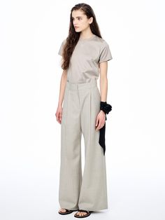 This is a casual and trendy pants by MARDI MERCREDI that is made out of high quality and sturdy material. With distinctive mood of the design and comfortable wear, you can style it for your casual summer outfit.- Tuck on the waist for wide silhouette- High quality wool blend fabric- Trendy and unique mood Summer Cotton Wide Leg Work Pants, Khaki Dress Pants For Spring, Casual Khaki Dress Pants For Summer, Spring Khaki Dress Pants, Chic Tailored Cotton Pants, Khaki Dress Trousers For Spring, Spring Khaki Dress Trousers, Casual Tailored Wide Leg Cotton Pants, Khaki Straight Dress Pants For Summer