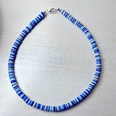 Handmade With Heishi Clay Beads With A Stretch Band. Not Recommend For Swimming/Showering In. These Necklaces Come In Many Colors And Styles. Request For Certain Color’s And Length Are Accepted And Will Be Considered Within Reason. All Necklaces Are New Without Tags, But Never Worn. 2mm Bead Necklace, Blue Strand Necklaces With Colorful Beads, Blue Heishi Beaded Necklaces For The Beach, Blue Heishi Beads Necklace For Beach, Blue Round Beaded Necklaces For Beach, Blue Beaded Necklaces For The Beach, Handmade Blue Heishi Beads Necklaces, Adjustable Blue Beaded Strand Necklace, Blue Strand Necklace With Tiny Beads