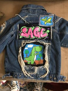 Custom graffiti style denim jackets for adults and children. Prices vary on sizes, please message us for details and questions. Turnaround time is about 2 weeks. Hand Painted Cotton Denim Jacket For Streetwear, Trendy Hand Painted Outerwear For Streetwear, Custom Artwork Cotton Denim Jacket For Streetwear, Spring Denim Jacket With Custom Artwork For Streetwear, Graffiti Fashion, Diy Fashion Clothing, Painted Denim, Graffiti Styles, Western Cowgirl