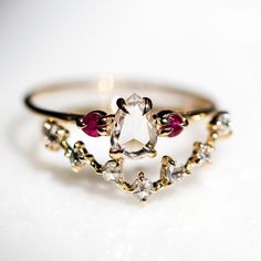 We love all things tiny, shiny and gold. Snow White Engagement Ring, Kenna Core, Weird Engagement Rings, Heirloom Engagement Rings, Nontraditional Engagement Rings, Morganite Engagement Ring Set, Queen Rings, Pink Morganite Engagement Ring, Ankle Jewelry