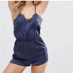 Navy Blue Crinkle Satin Romper With Really Beautiful Black Eyelash Lace Trim & T-Back Styling With Tiny Mother Of Pearl Buttons Down Center Back. Would Look Great Casually Styled With An Oversized Duster Sweater & Some Neutral Knee Boots, Or With A Leather Jacket, Tights And Booties For A Dressier Look. Has A Really Pretty Vintage Feel To It While Still Being Playful & Modern! Nwot Chic Stretch Summer Sleepwear, Chic Sleeveless Sleepwear, Chic V-neck Sleepwear, Chic V-neck Sleepwear For Night Out, Chic V-neck Sleepwear For Date Night, Fitted Sleepwear For Date Night In Summer, Chic Summer Party Sleepwear, Chic Sleepwear For Spring Parties, Chic Sleepwear For Party In Spring