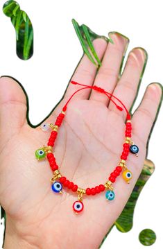 Evil Eye Bracelet For Festivals, Symbolic Handmade Beaded Bracelets For Good Luck, Handmade Symbolic Beaded Bracelets For Good Luck, Red Bohemian Evil Eye Bracelet For Festivals, Red Bohemian Evil Eye Jewelry, Bohemian Red Evil Eye Jewelry, Red Bohemian Beaded Bracelets With Evil Eye, Red Evil Eye Jewelry For Festival, Bohemian Red Beaded Evil Eye Bracelet