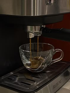 coffee being poured into a glass bowl