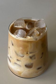 an iced drink in a glass with ice cubes