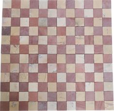 a tile floor with different colored tiles on it