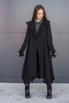 ➤ Features Length: front - 105 cm, back - 120 cm Open front cut cardigan type Long sleeves Bare back Oversized layered hoodie Flared Removable belt Pockets on the sides ● The model is 5'6″ (168cm) tall ● The model is a S ➤ Sizing SIZE CHART (cm/inch) XS-bust 85/33.5, waist 66/26, hips 91/35.8 S-bust 90/35.5, waist 71/28, hips 97/38 M-bust 95/37.4, waist 76/30, hips 102/40 L-bust 102/40, waist 83/32.7, hips 109/43 XL-bust 109/43, waist 90/35.5, hips 116/45.5 2XL-bust 116/45.5, waist 97/38, hips 1 Gothic Outerwear For Larp In Fall, Fall Gothic Outerwear For Larp, Gothic Outerwear For Halloween, Gothic Black Outerwear For Halloween, Black Gothic Outerwear For Halloween, Gothic Black Halloween Outerwear, Gothic Black Outerwear For Larp, Black Outerwear For Larp Halloween, Witchy Long Sleeve Outerwear For Fall