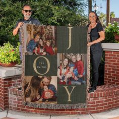 a man and woman standing next to a large blanket with photos on it that says joy