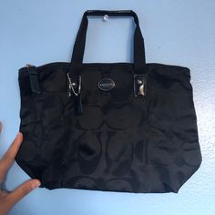 Black Coach Shoulder Bag. Has One Main Interior Zipper Pocket With A Beige Interior. Comes With Coach “C” Print All Over The Bag With A Coach Tag And Emblem. No Original Tags Or Packaging But Never Used And In Great Condition. Black Bags With Snap Closure For Errands, Black Shoulder Bag With Snap Closure For Errands, Coach Black Shoulder Bag For Errands, Coach Black Shoulder Bag With Top Carry Handle, Black Coach Shoulder Bag With Top Carry Handle, Black Double Handle Bag With Snap Closure, Black Bags With Snap Closure For Shopping, Casual Black Coach Bag, Trendy Black Coach Shoulder Bag