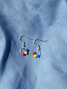 Handmade pansexual/panromantic hoop earrings, silver or black. A great gift for you or your LGBT+ family! I ship all orders within 1-3 days, and make sure to package orders carefully to prevent problems during delivery. If there are any problems with your order just message me and I'll be sure to accommodate as much as I can. Gay Earrings, Package Orders, Hoop Earrings Silver, Earrings Hoop, Earrings Silver, Belly Button Rings, Hippie Boho, Jewelry Earrings Dangle, Dangle Drop Earrings