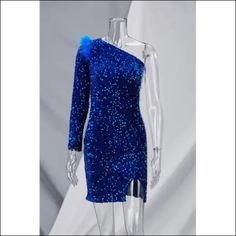 This exquisite Sequin Feather One-Shoulder Chained Up Mini Dress will add a touch of luxury to any special occasion. An eye-catching combination of sequins and feathers make for a truly unique design. The addition of a chain detail along the side and a mini dress silhouette make for a bold and glamorous look. Decoration Sequined , Feathers Length Above Knee, Mini Style Sexy & Club Fabric Type Sequin , Blended fabrics , Mesh Material Polyester , Spandex Neckline One Shoulder Pattern Type Patchwor Blue One Shoulder Dress For Prom Party, Blue One-shoulder Dress For Prom Party, Blue One-shoulder Dress For Prom Season Party, Blue One Shoulder Dress For Prom Cocktail, Glamorous Blue One-shoulder Prom Dress, Blue One Shoulder Party Dress, Blue One-shoulder Summer Party Dress, Blue Feather Trim Dress For Night Out, Glamorous Blue One Shoulder Evening Dress