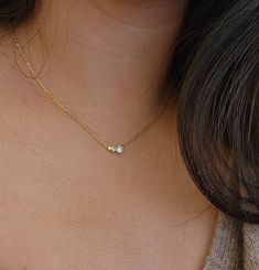 Discover the elegance of our jewelry, where each piece is meticulously designed to suit your style. Celebrate special moments with our beautifully crafted for bridesmaid gifts, and enhance your charm with this modern gold necklace. Express your unique style and layer the necklace to elevate your look! This three stone necklace exudes chic simplicity, and adds a touch of sophistication. Explore the allure of timeless pieces in our collection, and complete your look with the loveliness of our intr Delicate Charm Necklaces For Bridesmaid Gift, Elegant Hypoallergenic Necklaces For Mother's Day, Elegant Hypoallergenic Round Pendant Necklace, Elegant Personalized Diamond White Necklace, Elegant Hypoallergenic Jewelry For Mother's Day, Minimalist Hypoallergenic Diamond Jewelry, Elegant Hypoallergenic Round Pendant Jewelry, Elegant Hypoallergenic Pendant Necklaces, Elegant Hypoallergenic Pendant Necklace