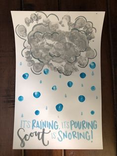 this is an art project for kids to do with watercolors on paper that says it's raining, its pouring sort is smoring