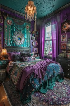 a bedroom decorated in purple and teal with a chandelier hanging from the ceiling