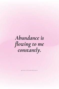 the words abundance is flowing to me constantly, on a pink background with black lettering