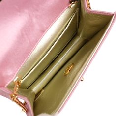 This Vintage mini flap bag is in Pink satin with gold hardware, featuring a single straight front flap with signature CC logo turnlock, a rear slip pocket, and a gold chain link shoulder/crossbody strap.The interior is lined in gold leather and includes one slip pocket on the back wall. Collection: 2-series (1991-1994) Origin: FranceCondition: Vintage; Excellent - This bag retains its shape and structure. There are some signs of wear to the exterior, including dirt marks, light staining, and mod Pink Evening Shoulder Bag With Cc Turnlock Closure, Pink Evening Shoulder Bag With Cc Turnlock, Pink Formal Bags With Cc Turnlock Closure, Luxury Evening Flap Bag With Cc Turnlock Closure, Formal Pink Bags With Cc Turnlock Closure, Elegant Gold Flap Bag With Turn-lock Closure, Elegant Pink Double Flap Bag, Classic Gold Flap Bag For Evening, Formal Shoulder Flap Bag With Cc Turnlock Closure