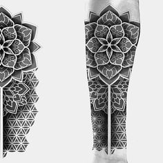 the legs and ankles are decorated with intricate designs, like this flower tattoo on one leg