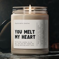 a candle that says you melt my heart on it