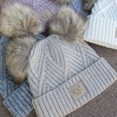 Keep your toddler or baby head warm and cozy in the CC Baby Double Pom Criss-Cross Pattern Beanie! Featuring an adorable criss-cross pattern and Authentic CC Branding, this beanie has a snug fit that's perfect for little heads. Crafted with a quality mix of the softest quality material and topped off with a plush faux fur pom, it's sure to be a hit! #TotWarm PRODUCT FEATURES: Quality Faux Fur Pom Authentic C.C ® Branding and Quality Diagonal Stripes Criss-Cross Pattern SIZING: C.C BABY ® Tag || Baby Winter Hat, Hats For Babies, Beanie Fits, Warm Hats, Baby Boy Toys, Baby Winter Hats, Slip Shorts, Cross Patterns, Diagonal Stripes