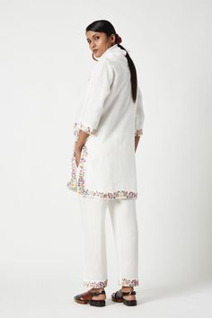 Editor's Note A round slit neck kurta with multi color floral embroidered details on neck, sleeves and base. It is teamed with straight cropped pants with hem details and a rich embroidered dup... Personal Shopping Service, Embroidered Dupatta, Linen Color, Fresh Summer, Embroidered Details, Kurta Set, Photographic Lighting, Personal Shopping, Cropped Pants