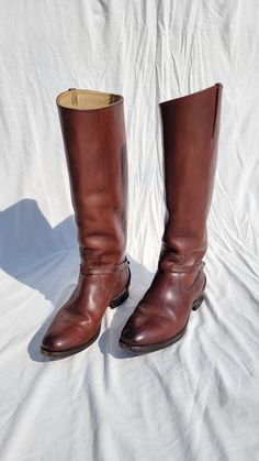 "Gorgeous calf high brown frye boots, perfect for fall weather. Looks great with everything! These are in great condition, and are barely worn. The color is a chestnut brown. Womens sz 6.5 B Height at tallest point: 16.5\" Heel size: 1\"" Rugged Brown Knee-high Boots For Fall, Brown Knee-high Riding Boots For Fall, Brown Moto Boots For Ranch In Winter, Brown Snip Toe Knee-high Boots For Fall, Classic Brown Knee-high Boots For Winter, Western Brown Knee-high Boots For Fall, Western Style Brown Knee-high Boots For Fall, Classic Distressed Brown Boots For Fall, Brown Knee-high Boots With Snip Toe For Western-themed Events