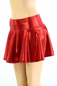 "This item is made to order, please read all the way through the listing before purchasing! This mini skirt is made from a brilliantly bold red metallic spandex. It is made of four way stretch lycra spandex. It has a soft, spandex waistband (elastic free) that sets at the natural waist. Womens Sizing (See below for instructions on where measurements should be taken) XXS: Bust 29\"-30\" / Waist 22\"-23\" / Hips 30\"-32\" Extra Small: Bust 31\"-32\" / Waist 24\"-25\" / Hips 33\"-35\" Small: Bust 3 Solid Shiny Party Bottoms, Shiny Solid Color Party Bottoms, Solid Shiny Bottoms For Party, Shiny Solid Color Bottoms For Party, Stretch Club Skort In Solid Color, Stretch Solid Color Skort For Club, Stretch Skort For Clubbing, Stretch Metallic Mini Skirt For Party, Shiny Stretch Mini Skirt