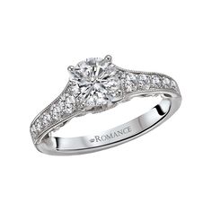 a diamond engagement ring on a white background