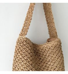 Casual Handheld Straw Bag Made Of Jute, Trendy Handwoven Beige Bucket Bag, Casual Jute Straw Handheld Bag, Casual Handheld Jute Straw Bag, Beige Handheld Straw Bag For Summer, Casual Handheld Jute Shoulder Bag, Handheld Beige Straw Bag For Summer, Beige Summer Handheld Straw Bag, Summer Beige Straw Handheld Bag