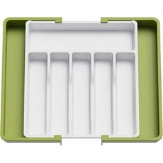 a green and white tray with six compartments for utensils on the bottom side