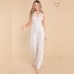 Red Dress Boutique Champagne Sequin Jumpsuit. V Neck With Self Tie Back. New With Tags. Perfect Condition. Size Small. Fitted Sleeveless Jumpsuit For Prom, Sleeveless Fitted Jumpsuits And Rompers For Prom, Elegant Jumpsuits And Rompers For Prom And Party Season, Elegant Jumpsuits And Rompers For Prom, Sleeveless Jumpsuits And Rompers For Wedding Party, Elegant Summer Jumpsuits And Rompers For Prom, Fitted Floor-length Jumpsuits And Rompers For Date Night, Chic Holiday Jumpsuits And Rompers With V-neck, Glamorous V-neck Jumpsuits And Rompers For Holiday