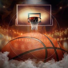 a basketball flying through the air next to a basket on top of a basketball court