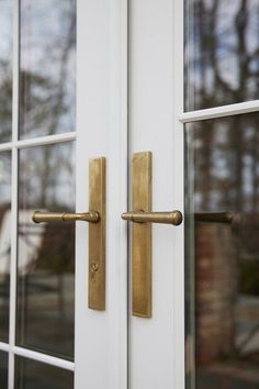 an open door with two handles on it