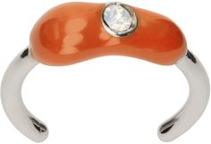 Open band toe ring in silver-tone brass. Orange enamel with crystal at face. Available exclusively at SSENSE. Supplier color: Silver/Rust orange Luxury Orange Sterling Silver Jewelry, Sterling Silver Orange Ring With Polished Finish, Toes Ring Silver, Nickel-free Orange Novelty Jewelry, Nickel-free Orange Hoop Earrings, Nickel-free Orange Enamel Earrings, Orange Ceramic, Ceramic Rings, Toe Ring