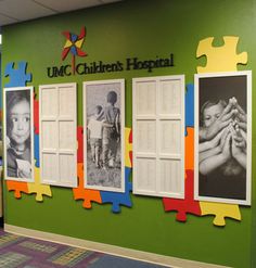 the children's hospital is decorated with jigsaw puzzle pieces and colorful artwork