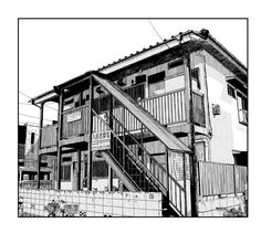 a black and white drawing of an apartment building with stairs leading up to the second floor